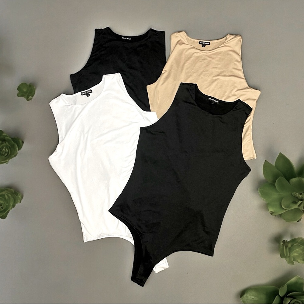 4 pack of high neck bodysuits